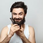Pielęgnacja brody. Jak dobrać szczotkę, trymer i kosmetyki do długości zarostu?